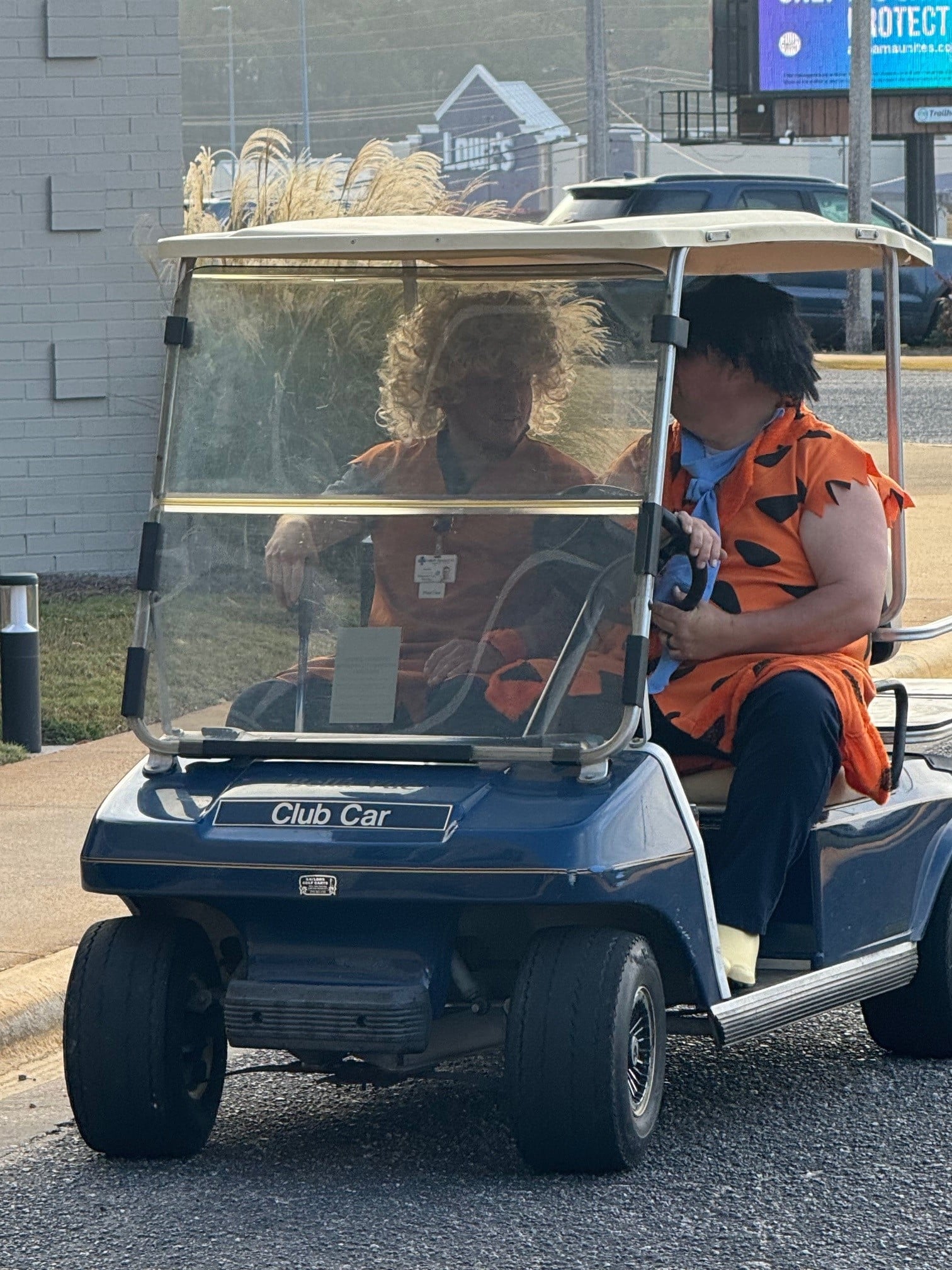 a man riding on the back of a truck