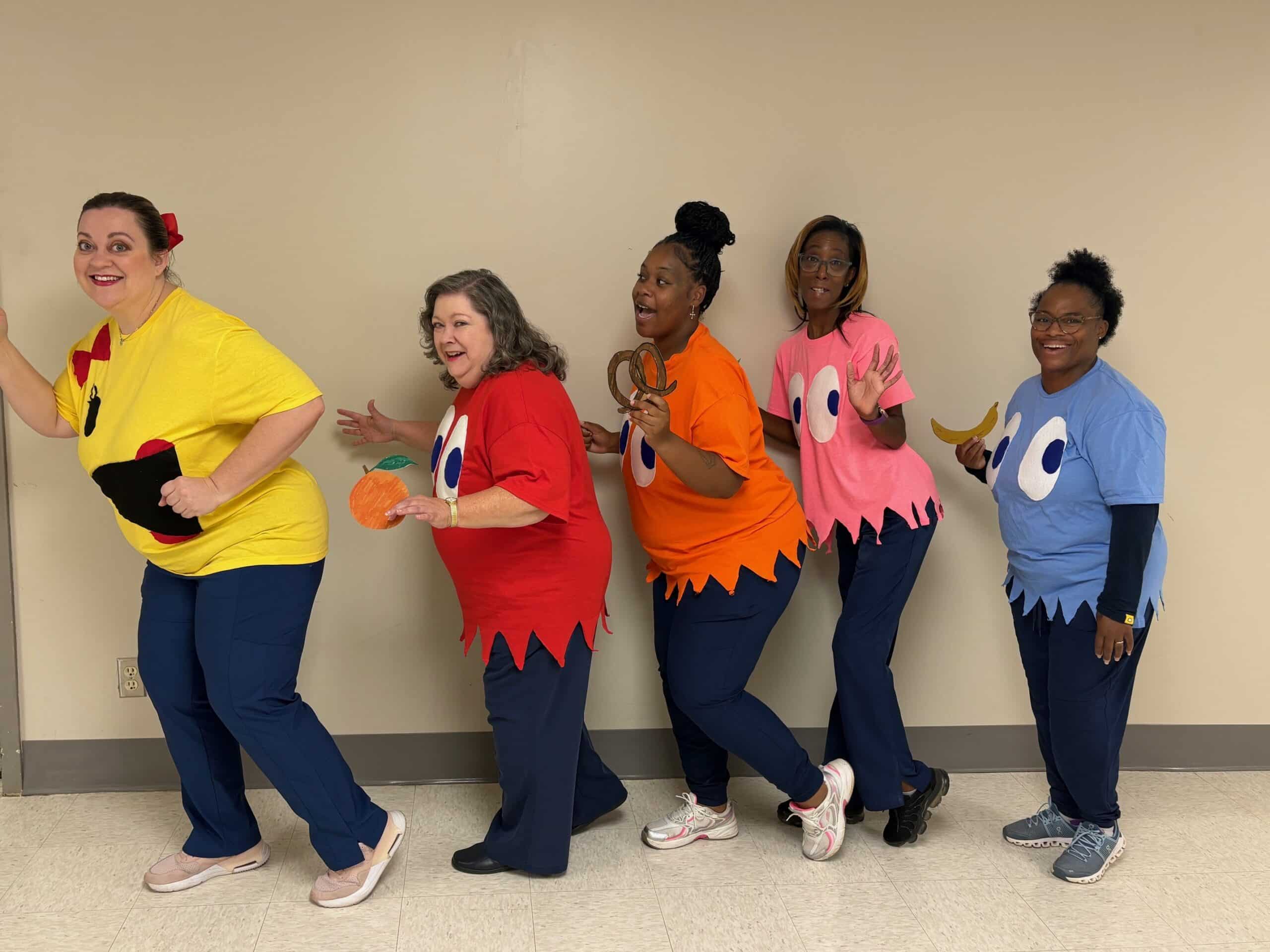 a group of people posing for the camera