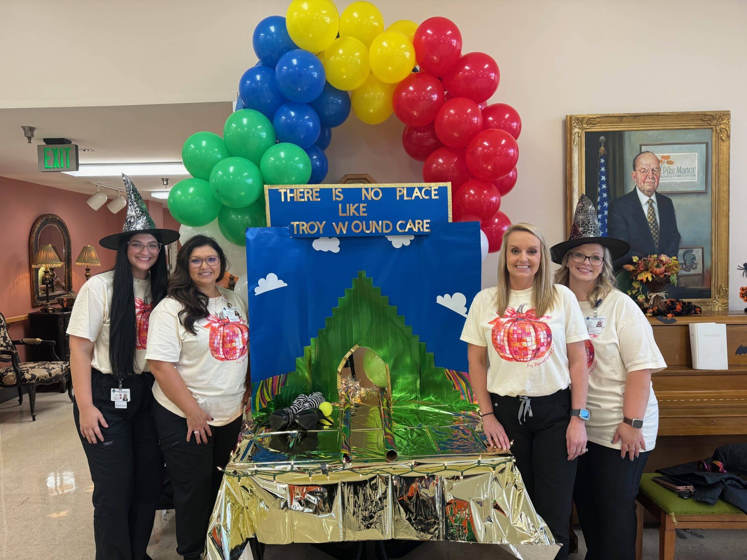 a group of people standing in front of a store