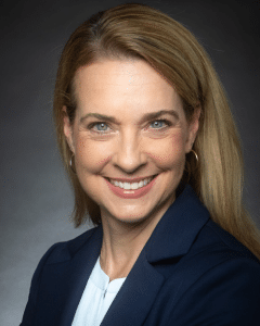 a woman smiling for the camera