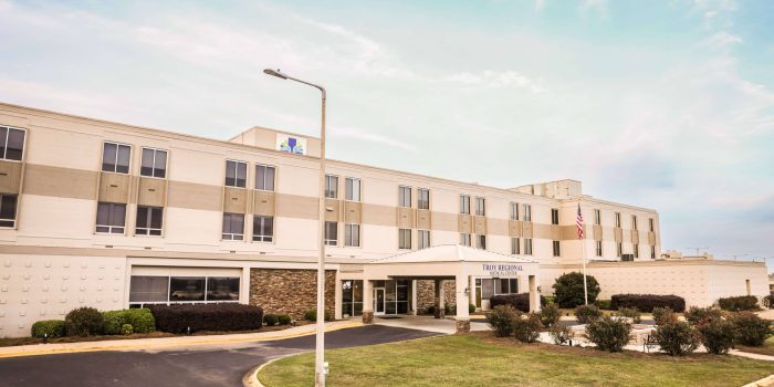 a castle on top of a dirt road