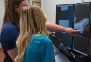 a woman in a blue shirt