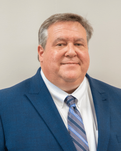 a man wearing a suit and tie