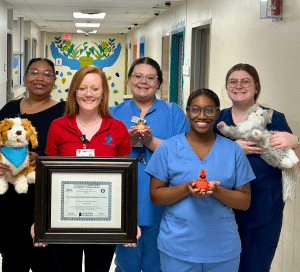 a group of people posing for a photo
