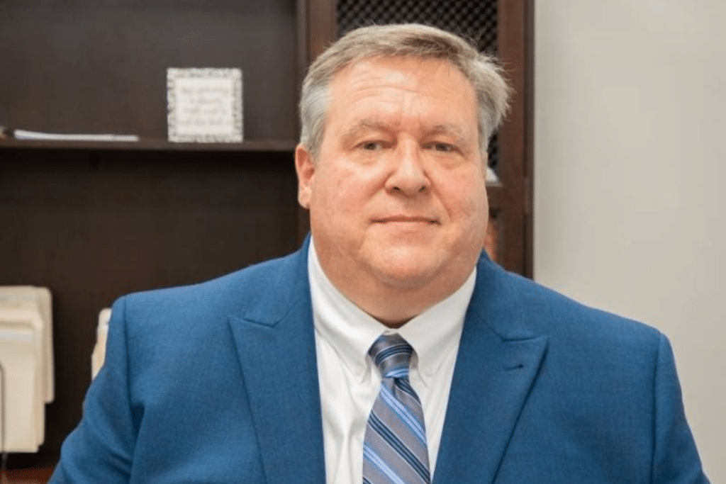 a man wearing a suit and tie